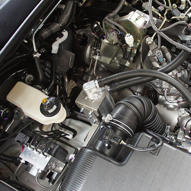 HPD catch can fitted in a diesel engine bay