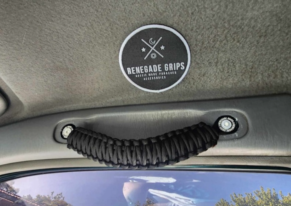 Renegade Grips Black Beauty paracord grab handle fitted to a roof grab handle mount with a black mounting kit