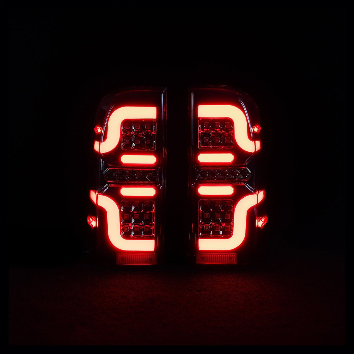 Blacked Out 'Swirl' LED Tail Lights for N70 Hilux