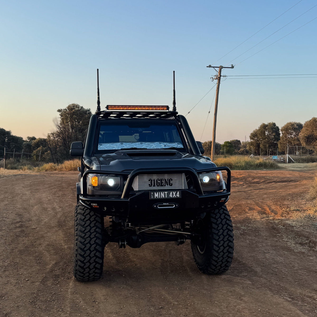 OEM+ Black Headlights to suit Toyota 70 Series