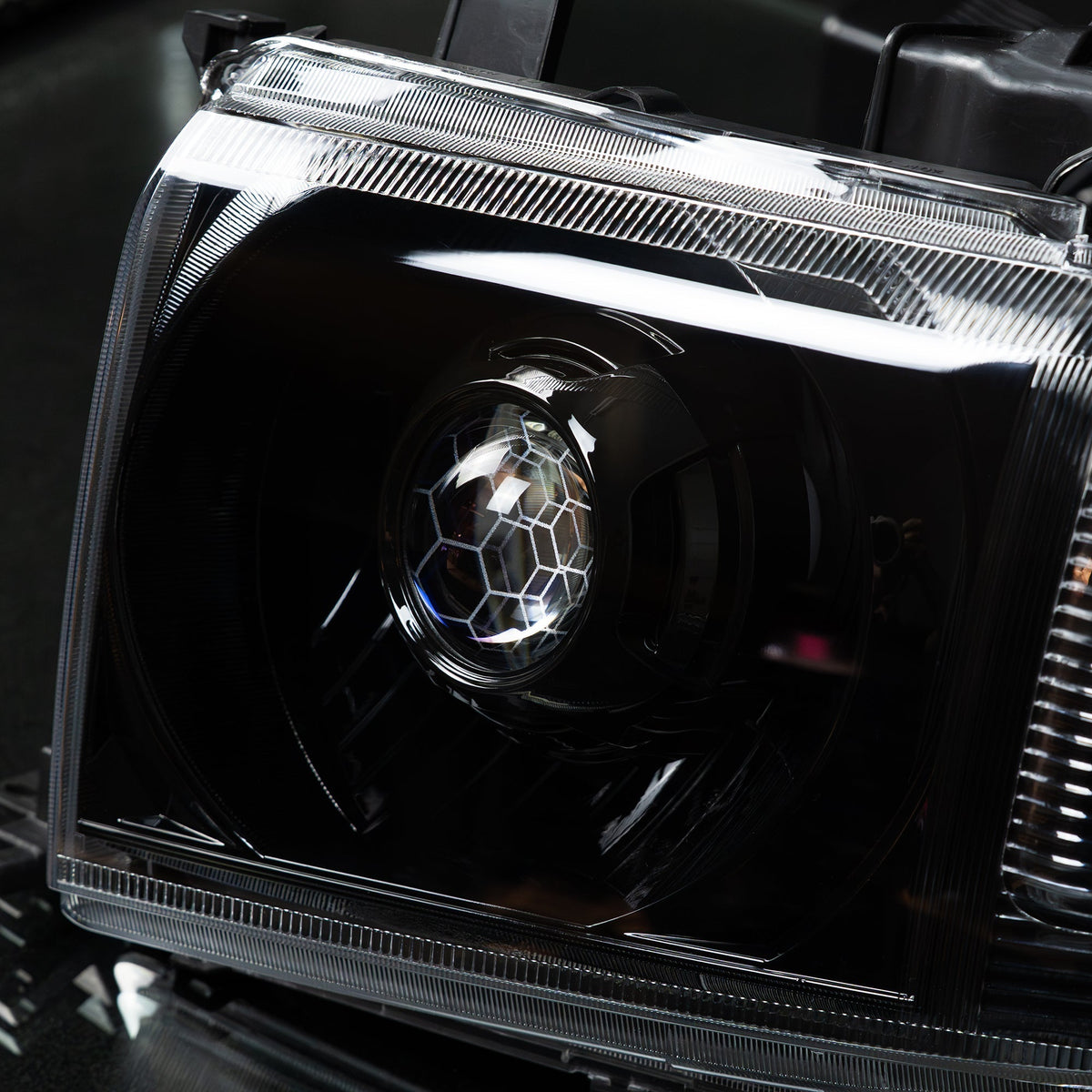 OEM+ Black Headlights to suit Toyota 70 Series