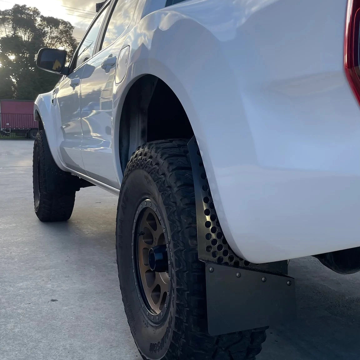 Styleworx Round Hole Angled Offset Mudflap - Adrenaline 4X4