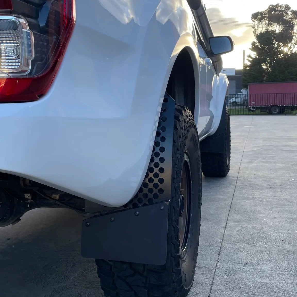 Styleworx Round Hole Angled Offset Mudflap - Adrenaline 4X4